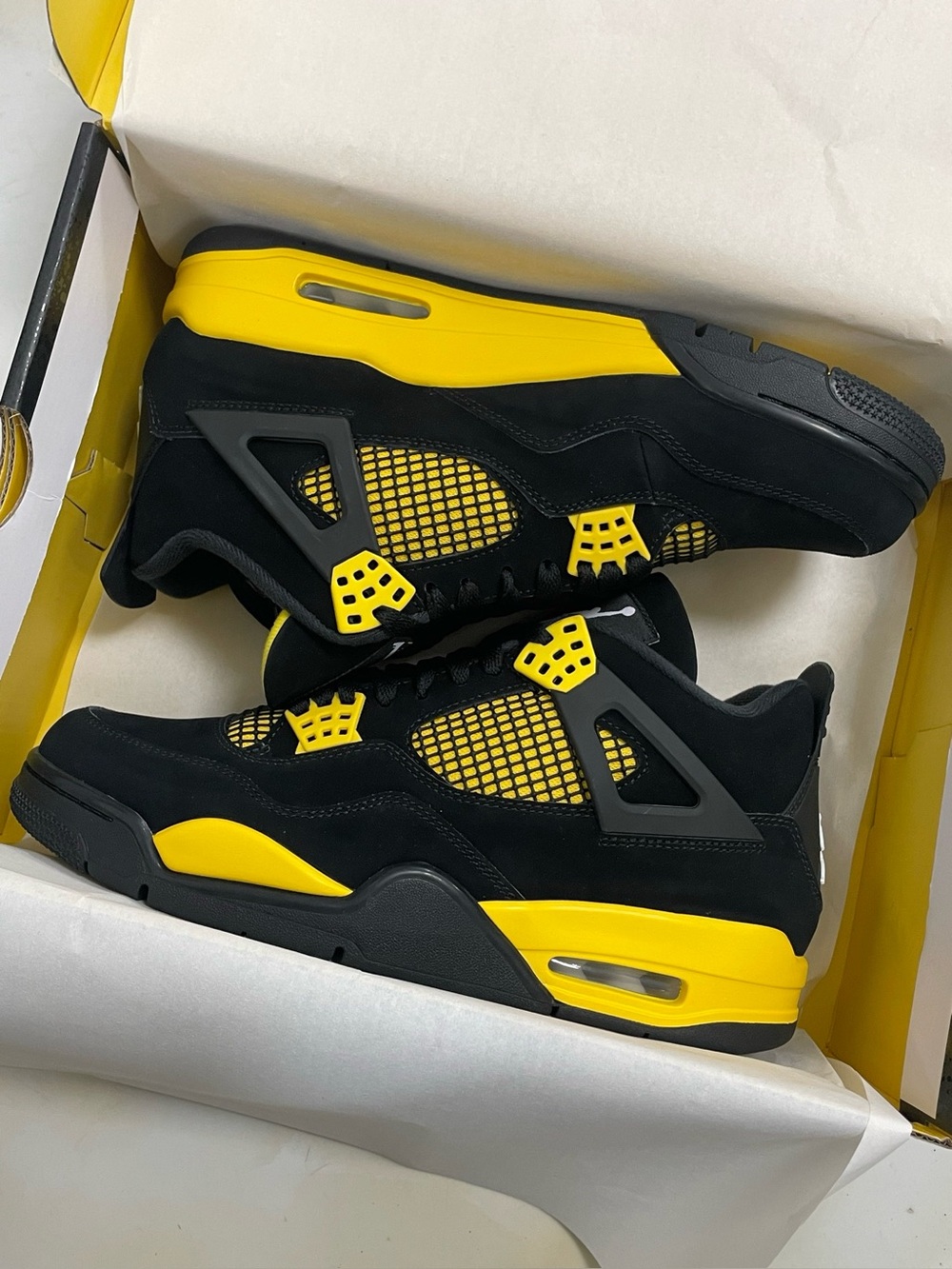 Jordan Brand AJ4 Retro Thunder Mid‑Top Retro Sneakers
